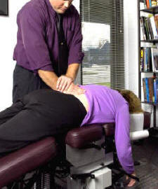 Flexion distraction therapy for spinal stenosis